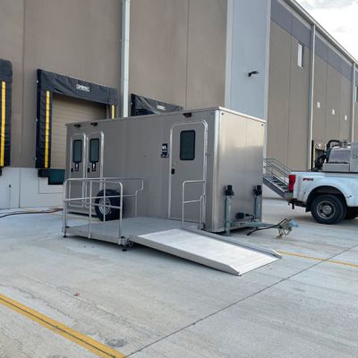 restroom trailer outside of loading dock