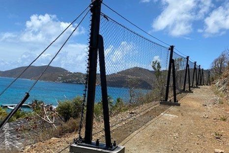 fence blocking rock falls