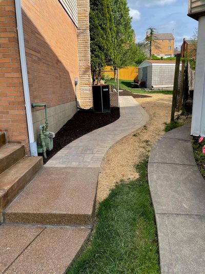 Image of a path leading to a backyard