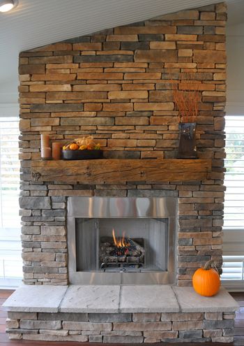 stone fire place with mantel.jpg