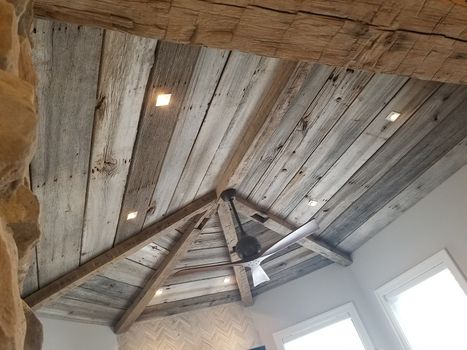 ceiling beams with grey barn siding. Tom on Hoover Dam.jpg