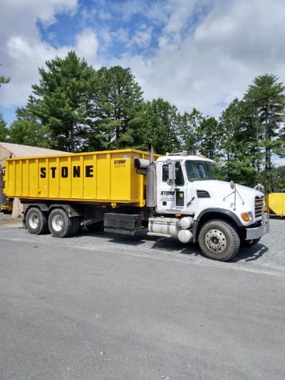 Stone junk removal truck