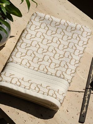 Glow Standard logo on a towel