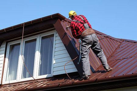 roofing contractor on roof