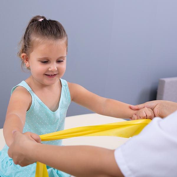 Young girl doing physical therapy