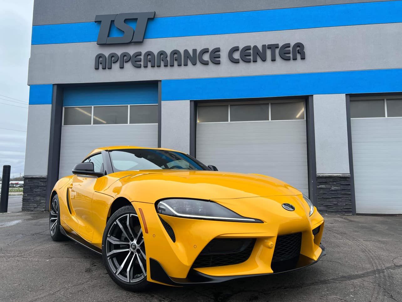 yellow car with logo.jpg