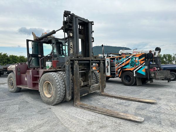 machine next to a Titus Machine Repair truck