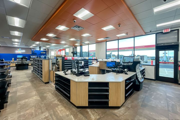 Convenience store interior construction at Circle K in Sparta, WI, featuring check out counter, built by Hoeft Builders Convenience Store Interiors at Circle K in Sparta, WI - Hoeft Builders