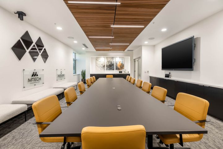 Office renovation with a large, modern boardroom at Mosaic Technologies in Cameron, WI – Hoeft Builders