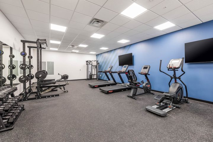 Office renovation with a gym and fitness room at Mosaic Technologies in Cameron, WI – Hoeft Builders