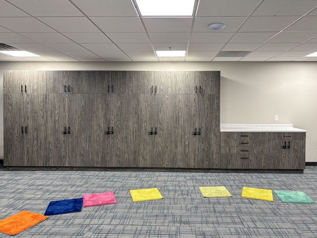 Image showing the casework in a music classroom at Veritas Classical Academy in Chippewa Falls, WI after the renovation completed by Hoeft Builders. Casework from a school renovation for Veritas Classical Academy in Chippewa Falls, WI - Hoeft Builders