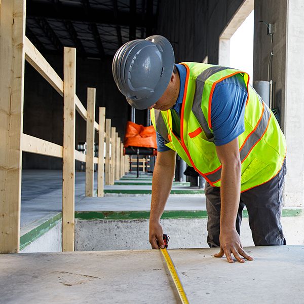 hoeft general contractor with tape measure