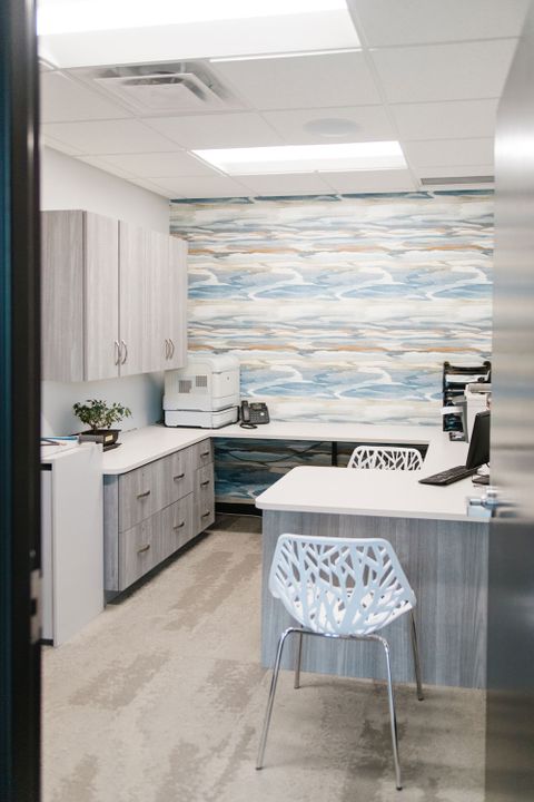 Interior construction at Horton Orthodontics in Woodbury, Minnesota, featuring a private office, built by Hoeft Builders Office construction at Horton Orthodontics in Woodbury, MN - Hoeft Builders