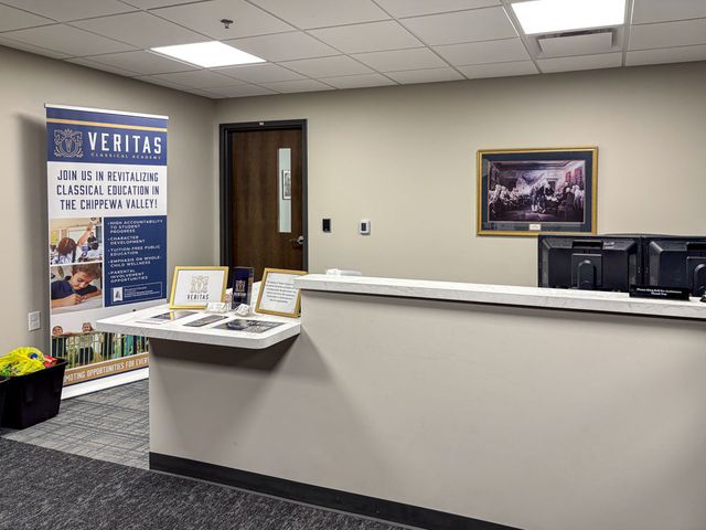 Image showing the front office at Veritas Classical Academy in Chippewa Falls, WI after the school renovation completed by Hoeft Builders. Front office school renovation for Veritas Classical Academy in Chippewa Falls, WI - Hoeft Builders