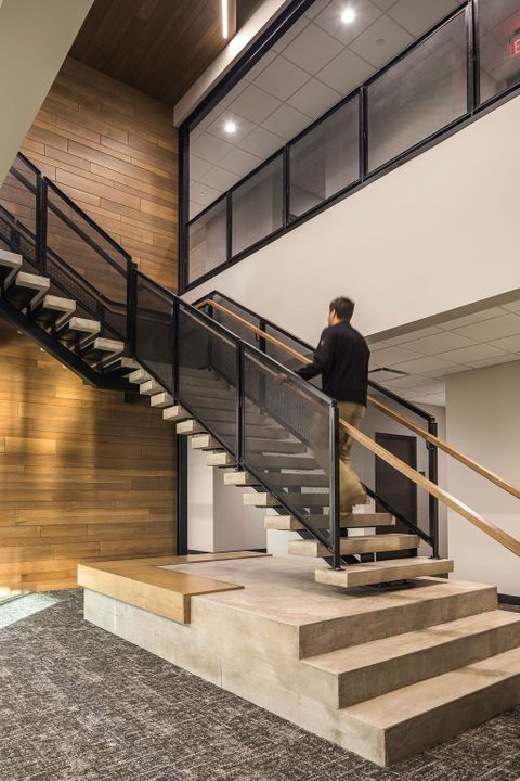 Architectural design of a custom poured-in-place office staircase at Hoeft Builders in Eau Claire, WI Architectural design of an office staircase at Hoeft Builders in Eau Claire, WI