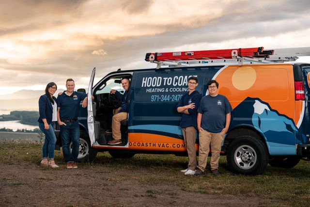 The Hood to Coast staff with branded. van