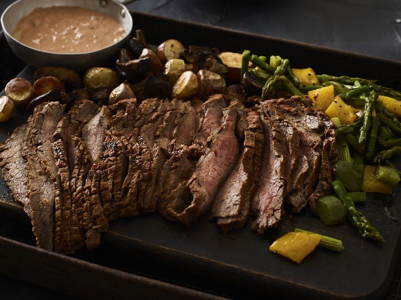 Six-Chile Beef Flank Steak with Southwest Tomato Cream & Roasted Vegetables
