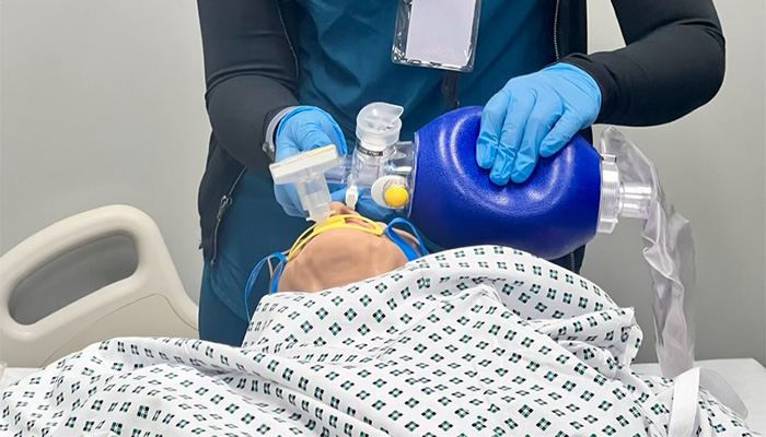 Community members in CPR training