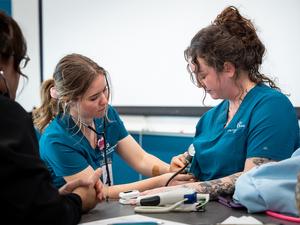 UNC-two-female-student-in-classroom.jpg