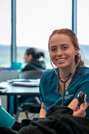 UNC-female-student-smiling-mobile.jpg